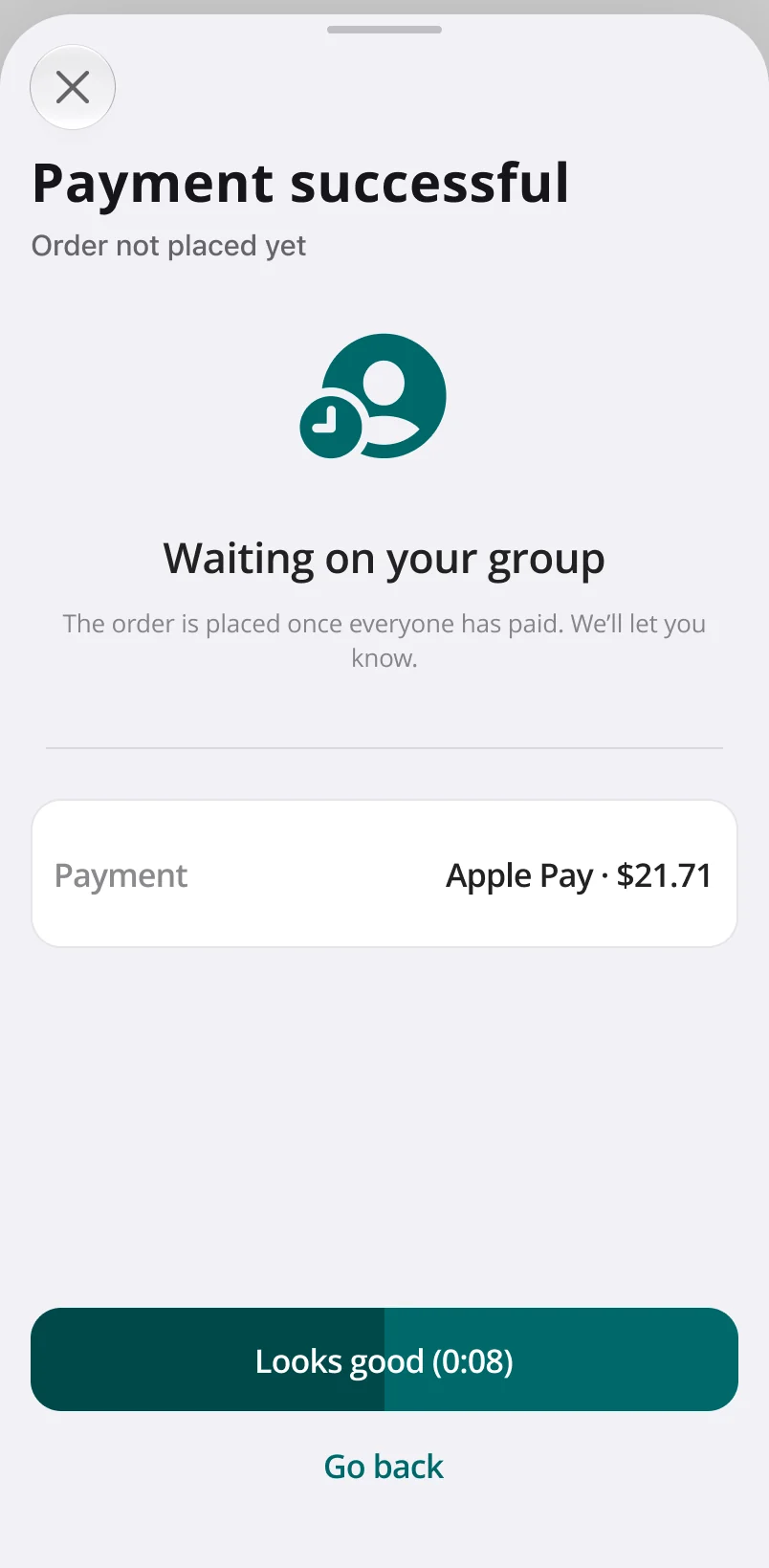 Payment successful sheet: your $21.71 share is paid and the order waits for the rest of the group before it is placed.